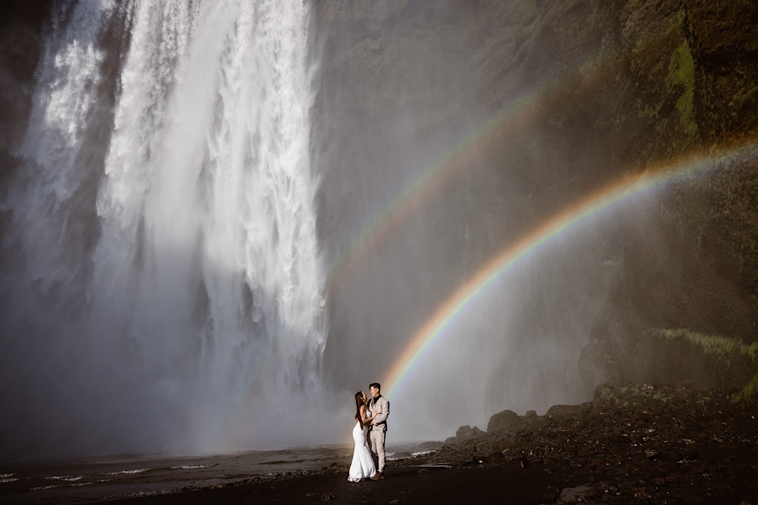 Couple eloping at Skogafoss in Iceland