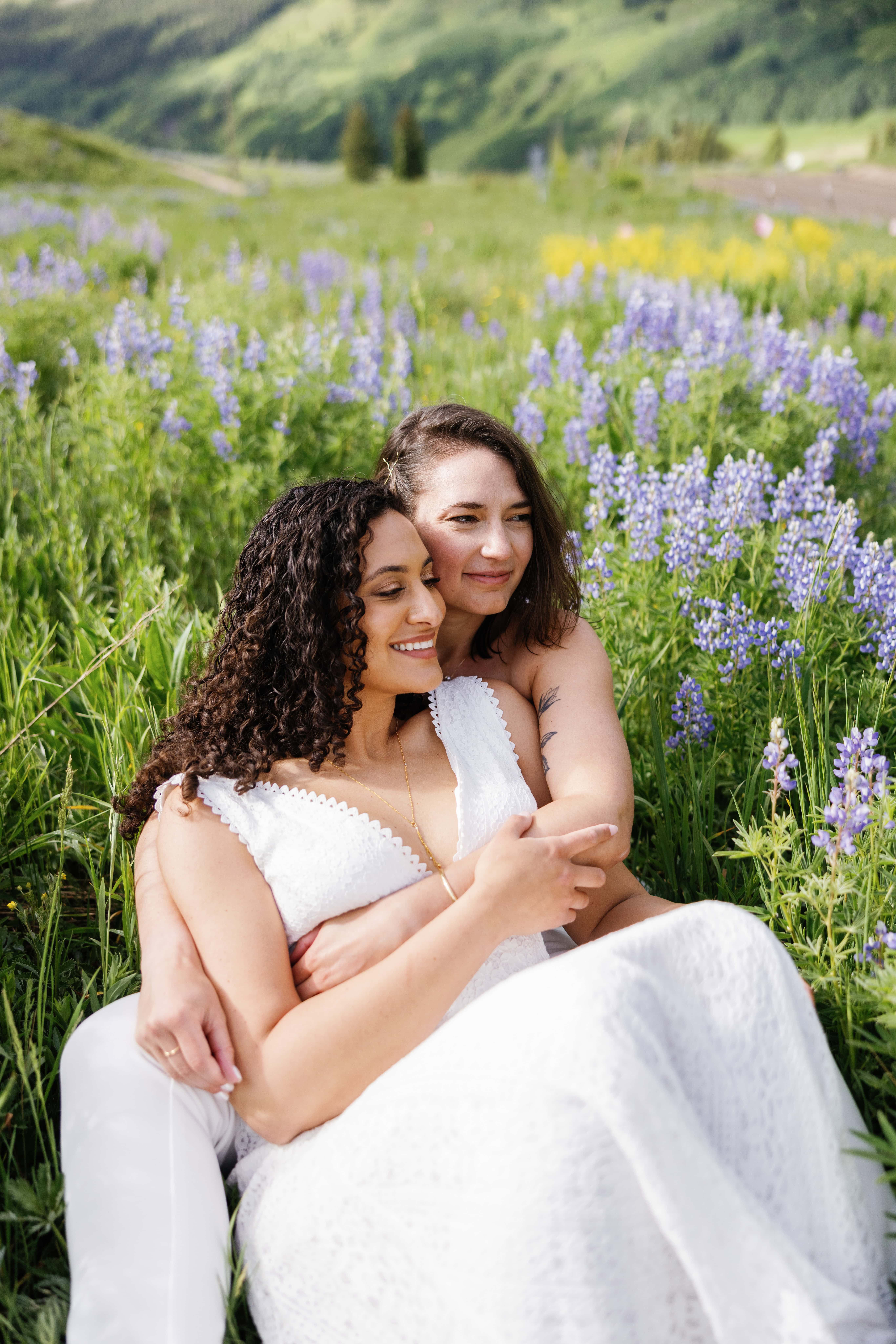 lupine field LGBTQ elopement in Crested Butte, CO