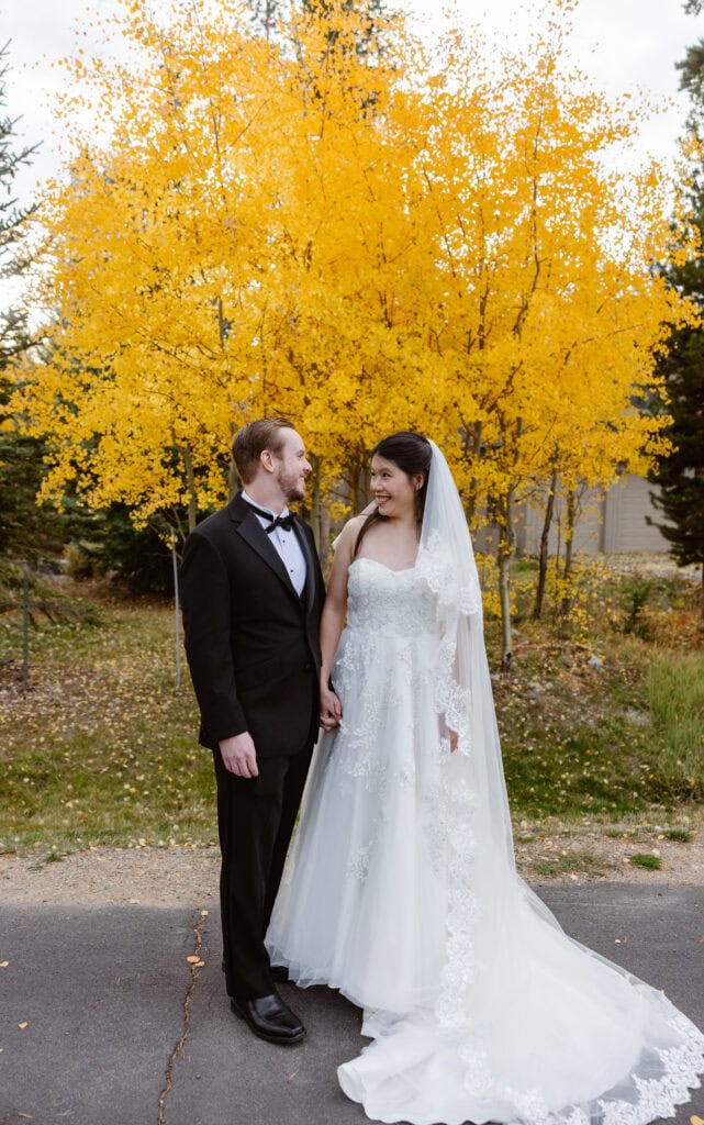 Couple getting married in the changing Aspens